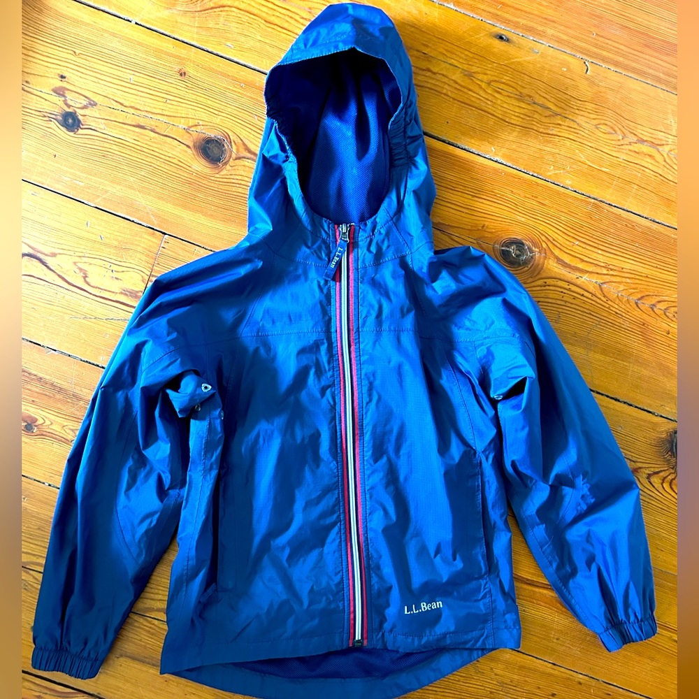 Unisex youth sz. 8 lightweight rain jacket. Great condition! Just outgrown.